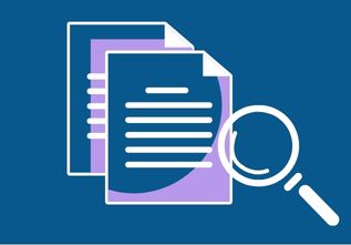 Documents and a  magnifying glass